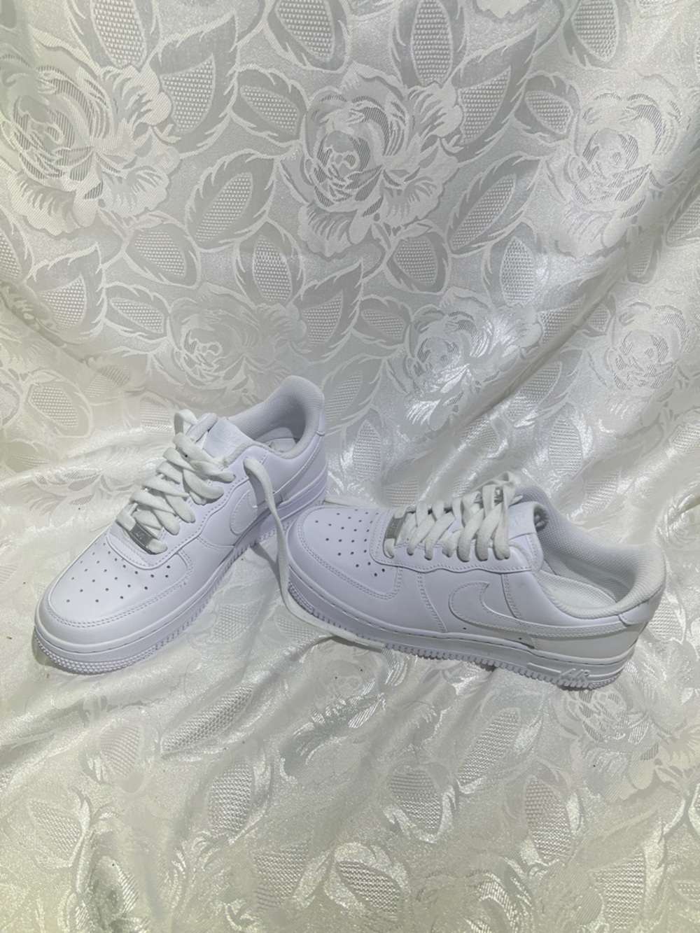 Nike Women’s All-White Leather Sneakers